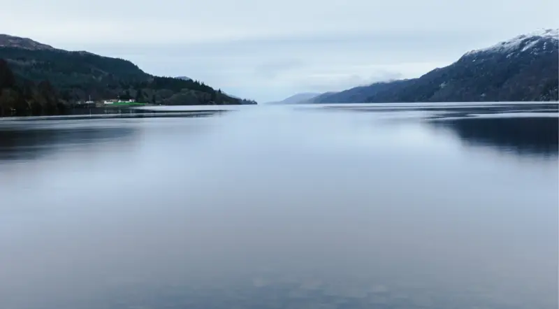 Loch Ness stretching south under winter light between snow-dusted hills